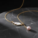 Collier ailes d'ange et perles d'eau douce blanches